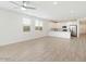 Bright living area featuring tile flooring and a modern ceiling fan at 4336 N 93Rd Dr, Phoenix, AZ 85037