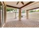 Outdoor patio featuring brick flooring, stucco walls, and a built-in barbecue area at 4725 E Winston Dr, Phoenix, AZ 85044