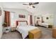 Serene bedroom features neutral tones, mirrored closet doors, and ample natural light at 614 W Morrow Dr, Phoenix, AZ 85027