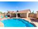 Backyard featuring a pool and spa, outdoor furniture, BBQ, and covered patio at 614 W Morrow Dr, Phoenix, AZ 85027
