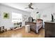 Cozy bedroom with neutral-toned walls, a ceiling fan, decorated with a comfortable bed and plenty of storage at 6814 N 11Th St, Phoenix, AZ 85014