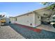 Home's exterior with covered patio and gravel hardscape at 6814 N 11Th St, Phoenix, AZ 85014