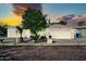 Charming single-story home featuring well-maintained landscaping and an attached two-car garage at 6814 N 11Th St, Phoenix, AZ 85014