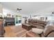 Spacious living room featuring a large sectional couch and an open concept design at 6814 N 11Th St, Phoenix, AZ 85014