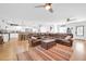 Spacious living room featuring a large sectional couch and an open concept design at 6814 N 11Th St, Phoenix, AZ 85014