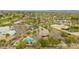 An aerial view of a luxurious home with a private pool and mature landscaping at 8126 E Vista Bonita Dr, Scottsdale, AZ 85255