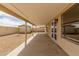 Covered patio leads to a low maintenance backyard at 8541 N 112Th Ave, Peoria, AZ 85345