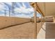 Low maintenance backyard with covered patio and a storage shed at 8541 N 112Th Ave, Peoria, AZ 85345