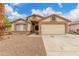 Charming single-story home with a well-maintained front yard, desert landscaping, and a spacious two-car garage at 8541 N 112Th Ave, Peoria, AZ 85345