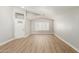 Inviting living area with wood-look floors and a front door with decorative glass at 8541 N 112Th Ave, Peoria, AZ 85345