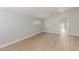 Open living area with wood flooring, clean lines, and bright neutral color palette at 8541 N 112Th Ave, Peoria, AZ 85345