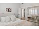 Cozy bedroom with soft natural light and closet with mirrored sliding doors at 9390 N 115Th St, Scottsdale, AZ 85259