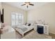 Bedroom with shutters, a ceiling fan, and a desk vanity with Hollywood-style lighting at 9390 N 115Th St, Scottsdale, AZ 85259