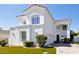 Beautiful two-story home boasting white stucco, a red tile roof, manicured lawn, and an attached two-car garage at 9390 N 115Th St, Scottsdale, AZ 85259