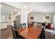 Spacious dining area connects the kitchen and living spaces, perfect for Gathering gatherings and entertaining guests at 1002 E Grandview Rd, Phoenix, AZ 85022