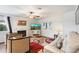 Inviting living room with a fireplace, comfortable seating, and a ceiling fan at 1002 E Grandview Rd, Phoenix, AZ 85022