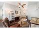 Cozy living room featuring hardwood floors and recessed lighting, radiating warmth and elegance throughout at 1002 E Grandview Rd, Phoenix, AZ 85022