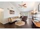 Cozy living room featuring hardwood floors, vaulted ceilings, and ample natural light at 1002 E Grandview Rd, Phoenix, AZ 85022