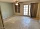 Bedroom featuring a ceiling fan and sliding glass doors to the backyard at 10250 N 65Th N Ave, Glendale, AZ 85302