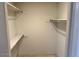 Walk-in closet with shelves and hanging rods at 10250 N 65Th N Ave, Glendale, AZ 85302