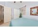 Bright bedroom with a queen bed, closet, and natural light from a window at 10356 E Meandering Trail Ln, Gold Canyon, AZ 85118
