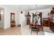 Inviting dining room with neutral tones, wooden furniture, and stylish decor at 10356 E Meandering Trail Ln, Gold Canyon, AZ 85118