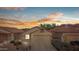 Charming home with a well-maintained front yard and a desert-themed landscape at 10356 E Meandering Trail Ln, Gold Canyon, AZ 85118