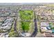 An aerial view of the neighborhood and home with easy access to the nearby greenbelt and park at 12698 N 153Rd Ave, Surprise, AZ 85379