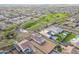 An aerial view of the neighborhood and home with easy access to the nearby greenbelt and park at 12698 N 153Rd Ave, Surprise, AZ 85379