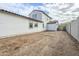 View of the rear of the home and garage highlighting the size of the property's backyard at 12698 N 153Rd Ave, Surprise, AZ 85379