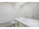 Bright bathroom with a combination tub/shower, vanity with white countertops and cabinets, offering comfort and convenience at 12698 N 153Rd Ave, Surprise, AZ 85379