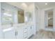Modern bathroom featuring double sinks and a shower over tub, providing comfort and functionality at 12698 N 153Rd Ave, Surprise, AZ 85379