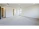 Spacious bedroom featuring plush carpet and an ensuite bathroom with lots of natural light at 12698 N 153Rd Ave, Surprise, AZ 85379