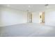 Large bedroom features plush carpets, and access to en suite bathroom for convenience at 12698 N 153Rd Ave, Surprise, AZ 85379