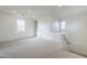 Bright bonus room featuring carpet floors, multiple windows, and recessed lighting fixtures at 12698 N 153Rd Ave, Surprise, AZ 85379