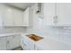 White quartz counter top and white subway tile backsplash at 12698 N 153Rd Ave, Surprise, AZ 85379