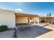 Exterior shot of the attached carport providing covered parking at this property at 13411 N 26Th Ave, Phoenix, AZ 85029