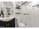 Beautiful bathroom features a modern vanity, stylish mirror and a glass-enclosed shower with tiled walls at 13614 N 38Th Pl, Phoenix, AZ 85032