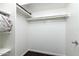 An organized walk-in closet with shelving and hanging rods for ample storage at 14145 N 92Nd St # 2077, Scottsdale, AZ 85260