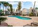 Resort-style community pool with lush landscaping and a covered cabana area at 14145 N 92Nd St # 2077, Scottsdale, AZ 85260