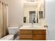 Well-maintained bathroom with a vanity, toilet, and neutral color scheme at 1567 S Western Skies Dr, Gilbert, AZ 85296