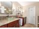 Modern bathroom with dual glass vessel sinks and granite countertops at 1567 S Western Skies Dr, Gilbert, AZ 85296