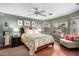 Cozy bedroom with a comfortable queen-size bed and neutral decor at 1567 S Western Skies Dr, Gilbert, AZ 85296