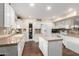 Bright, functional kitchen with an island and granite countertops offers style and utility at 1567 S Western Skies Dr, Gilbert, AZ 85296