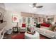Bright and open living room area features hardwood floors, neutral colors and lots of natural light at 1567 S Western Skies Dr, Gilbert, AZ 85296