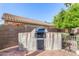 Built-in outdoor grill and counter on a brick patio, perfect for backyard barbecues and outdoor entertaining at 1567 S Western Skies Dr, Gilbert, AZ 85296