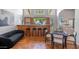Indoor bar area with seating, black sofa, and game table at 16446 N 59Th St, Scottsdale, AZ 85254