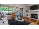 Comfortable living room with view to outdoor bar and pool at 16446 N 59Th St, Scottsdale, AZ 85254