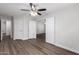 Inviting bedroom with new flooring and convenient access to other rooms and closets at 19008 N Lousandra Dr, Maricopa, AZ 85138