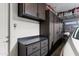 Garage featuring custom cabinets and drawers for organized storage at 20528 W Coolidge St, Buckeye, AZ 85396